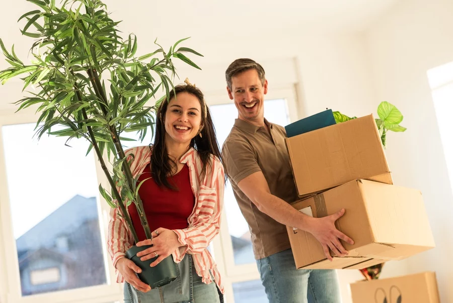 A couple moving into their new house